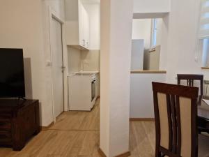 Kuchyň nebo kuchyňský kout v ubytování Apartment Olga