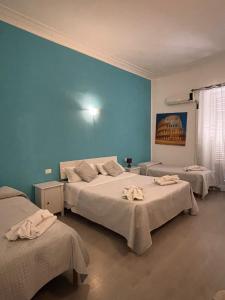 A bed or beds in a room at B&b Glamour
