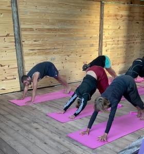 a group of people doing yoga in a room at Jardin de Epicuro in Colonia Chapadmalal