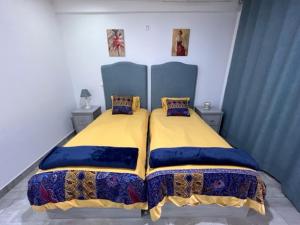 Postel nebo postele na pokoji v ubytování Casa dos Arcos