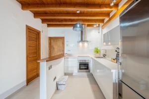 A kitchen or kitchenette at Loft en Milla de Oro