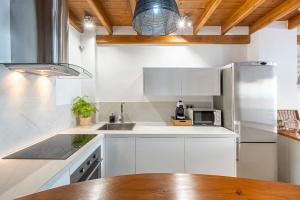 A kitchen or kitchenette at Loft en Milla de Oro