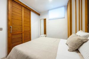 A bed or beds in a room at Loft en Milla de Oro