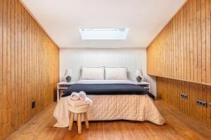 A bed or beds in a room at Loft en Milla de Oro Még 35 kép