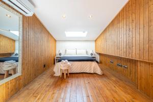 A bed or beds in a room at Loft en Milla de Oro