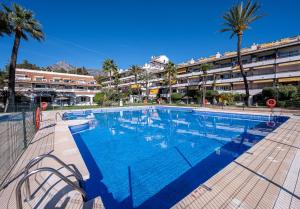 The swimming pool at or close to Loft en Milla de Oro