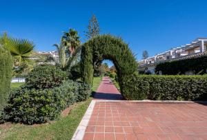 A garden outside Loft en Milla de Oro