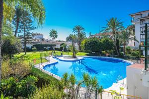 The swimming pool at or close to Loft en Milla de Oro