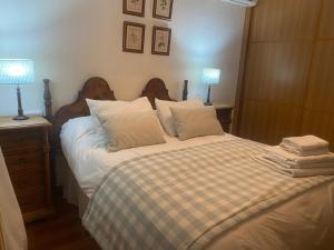 Giường trong phòng chung tại Casa Paloseto