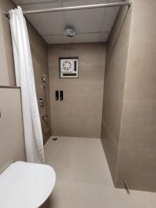 Koupelna v ubytování Hotel Ananda Kashi