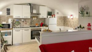 Kuchnia lub aneks kuchenny w obiekcie Ursino holiday apartment