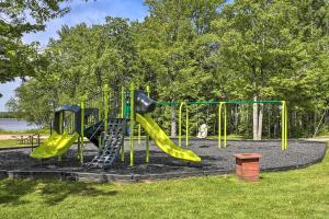 um parque infantil com escorrega num parque em Arrowhead Lake Vacation Rental with Fire Pit! em Pocono Lake
