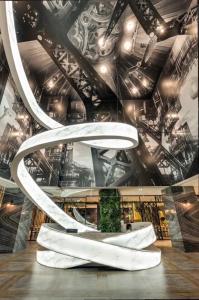 a room with a ceiling with graffiti on it at 凝萃文旅 台中車站店 NCH-Business Hotel in Taichung