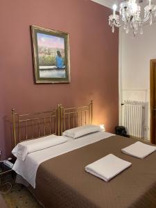 Кровать или кровати в номере Princess Guest House Canal View