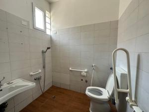 a bathroom with a toilet and a sink at Dream holiday in Mestre