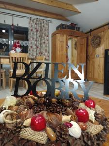 Kuchyň nebo kuchyňský kout v ubytování HORTUS apartament z klimatyzacją