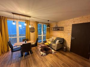Tiny house v Moravském Berouně的休息区
