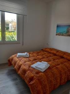 Postel nebo postele na pokoji v ubytování BED & BREAKFAST VAL di ERICE