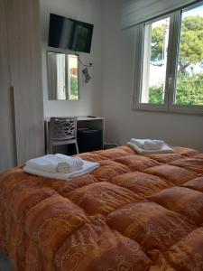 Postel nebo postele na pokoji v ubytování BED & BREAKFAST VAL di ERICE