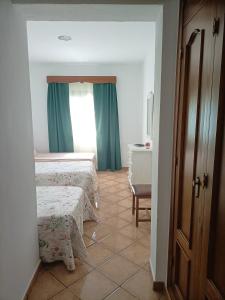 Postel nebo postele na pokoji v ubytování La Orquídea Morada + 22 fotografií
