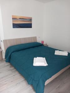 Postel nebo postele na pokoji v ubytování BED & BREAKFAST VAL di ERICE
