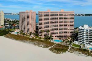 an aerial view of tall buildings on the beach at Steps to Beach & Pool - Resort Amenities Galore! in Clearwater Beach