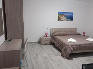Postel nebo postele na pokoji v ubytování BED & BREAKFAST VAL di ERICE