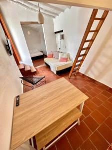 Ένα ή περισσότερα κρεβάτια σε δωμάτιο στο Terracota Loft Barichara +7 φωτογραφίες