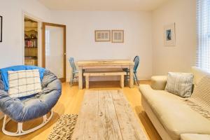 a living room with a table and a couch at Host & Stay - Sail Away in Whitstable
