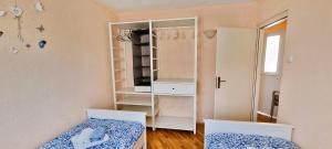 Posteľ alebo postele v izbe v ubytovaní Simic Apartments