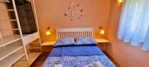 Posteľ alebo postele v izbe v ubytovaní Simic Apartments