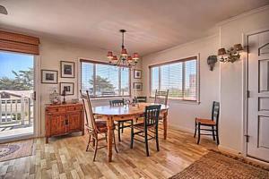 a dining room with a table and chairs at 275 Stafford in Cambria