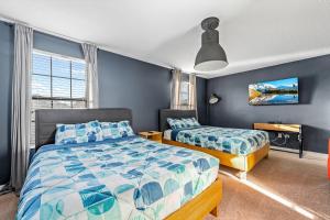 Llit o llits en una habitació de Heated Pool + Free Waterpark + Lazy River + Grill