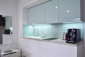 Kuchyňa alebo kuchynka v ubytovaní Apartament Horyzont 101 + 15 fotografií