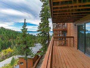 a balcony of a house with a view at 4 bedroom 3 5 bathrooms lake view condo in Incline Village