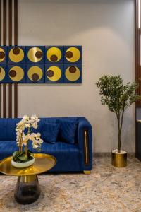 Area tempat duduk di Royal Rawal - Luxury Boutique Hotel