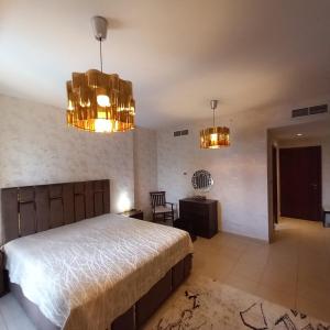 Postel nebo postele na pokoji v ubytování Dubai-Marina, JBR, 1 BR Murjan 1