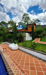 a rendering of a house with a swimming pool at NG Glamping a 20 min de Neiva in Neiva