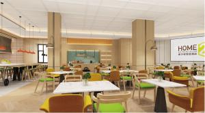 Home2 Suites By Hilton Hotel Guangzhou Baiyun International Airport Branch - Free Shuttle Bus to Guangzhou Baiyun International Airport & Free Deliver Service to Canton Fair Complex During Canton Fair Periodにあるレストランまたは飲食店