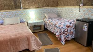 Tempat tidur dalam kamar di Mecohue