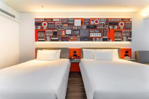 Voodi või voodid majutusasutuse Ibis Styles Hotel - 260M from Guangji Street Subway Station toas