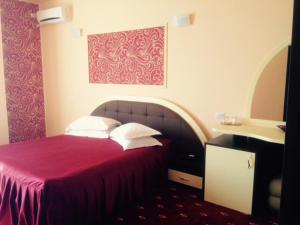 Postel nebo postele na pokoji v ubytování Hotel Kleyn
