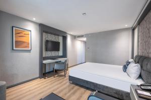 Four Points Flex by Sheraton Antalya Lara客房内的一张或多张床位