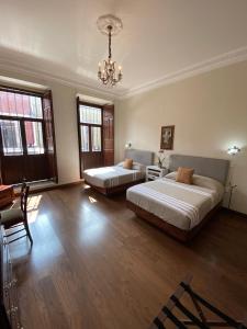 Postel nebo postele na pokoji v ubytování Hotel Cantera Real, Morelia + 37 fotografií