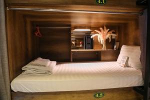 Postel nebo postele na pokoji v ubytování Saigon Chill Hostel