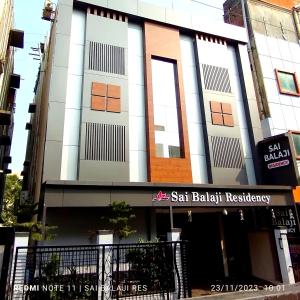 a building with a safeway sign in front of it at Sai Balaji Residency in Shirdi