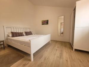 Postel nebo postele na pokoji v ubytování Residence Mama