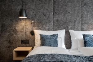 Posteľ alebo postele v izbe v ubytovaní Ski & Bike Hotel Wiesenegg