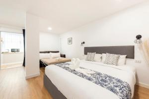 Cama o camas de una habitación en Lee's Mark Residence