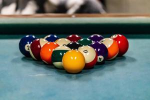 a group of pool balls on a pool table at Hotel Alf in Krakow +41 photos